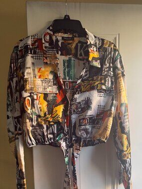 Graffiti Newsprint Cropped Tie-Front Shirt.